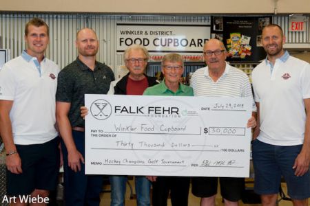 FalkFehr 2019 cheque presentation Food Cupboard.jpg